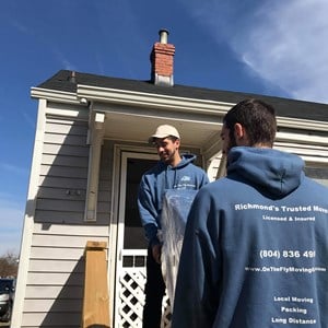 On The Fly Moving Guys, LLC Logo