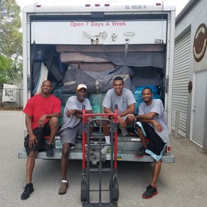 Reed’s Moving & Storage LLC Logo